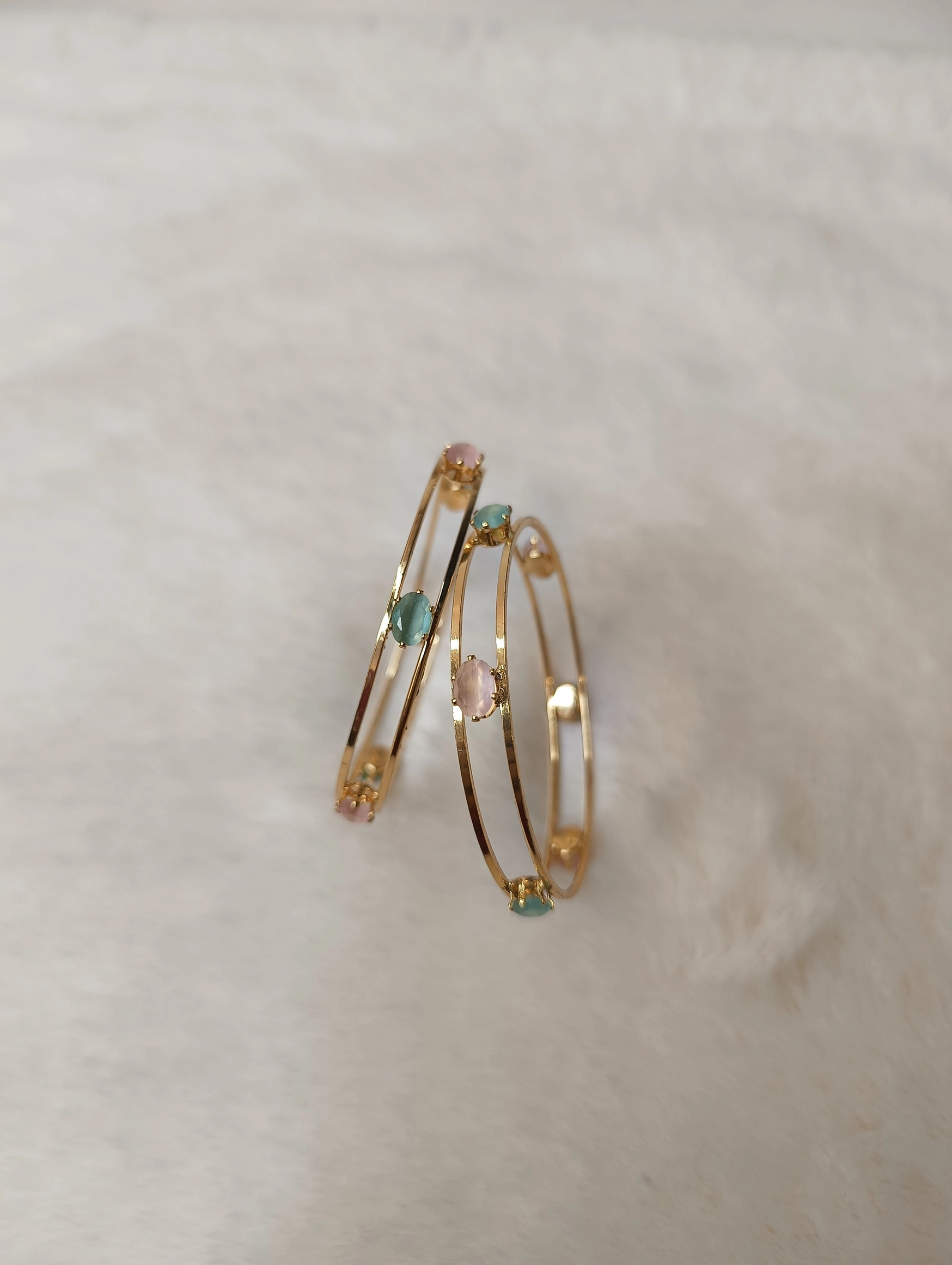 Modern gold-tone bangles. 2