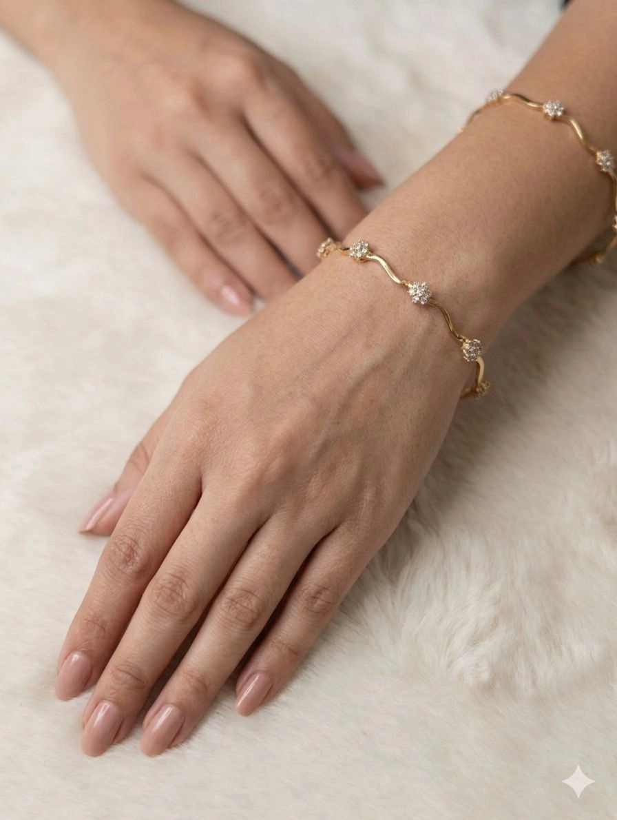 Floral wavy gold bangle